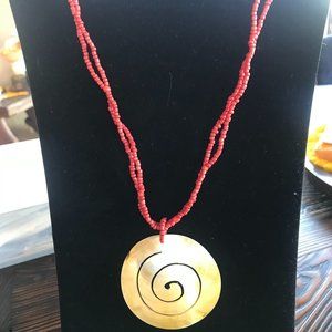 RED SEED BEAD NECKLACE WITH CARVED OUT ROUND SHELL  NWOT